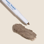 Cream eye shadow stick in shade Love At First for a smokey, grey beige taupe with natural shimmer