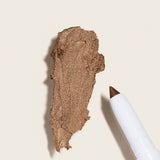 Cream eye shadow stick in shade At A Glance is a deep warm cocoa